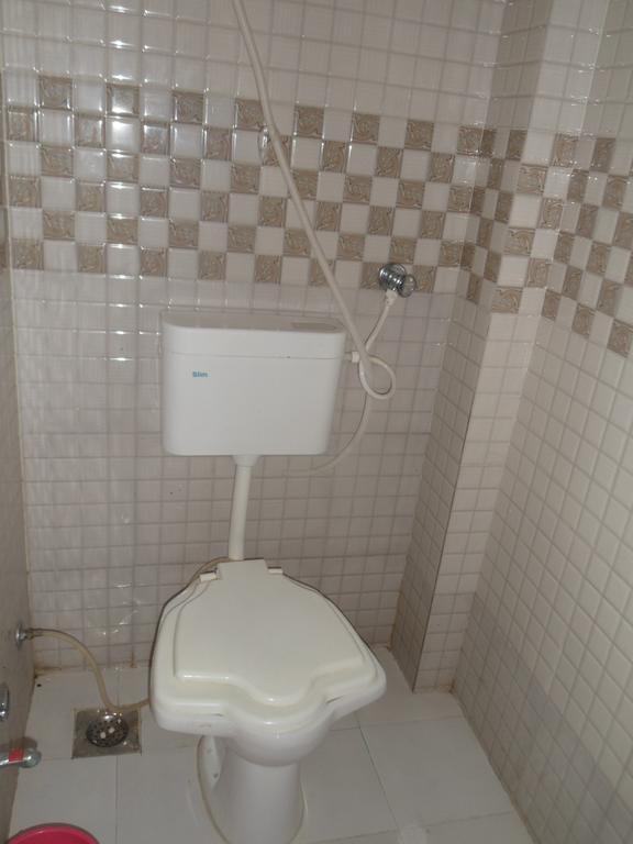Hotel Madhusudan Dwārka Habitación foto